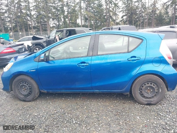 2013 Toyota Prius c One with VIN JTDKDTB39D1058324, listed as a IAAI auction lot 41916103 with 68,079 mi miles. Bid and sale history available at carsss.com. Image 14.