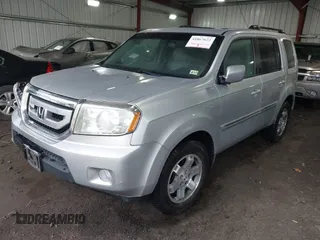 2011 Honda Pilot Touring with VIN 5FNYF4H90BB084692, listed as a IAAI auction lot 41867622 with 62,805 mi miles. Bid and sale history available at carsss.com. Image 17.