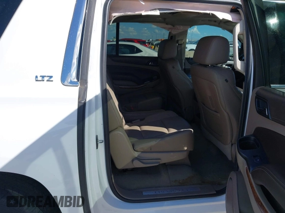 2016 Chevrolet Suburban LTZ with VIN 1GNSKJKC0GR109295, listed as a IAAI auction lot 42612085 with 200,912 mi miles and . Bid and sale history available at DreamBid. Image 8.