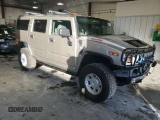 2003 Hummer H2 with VIN 5GRGN23U53H101713, listed as a Copart auction lot 85216034 with 189,549 mi miles and Non Repairable. Bid and sale history available at carsss.com. Image 4.