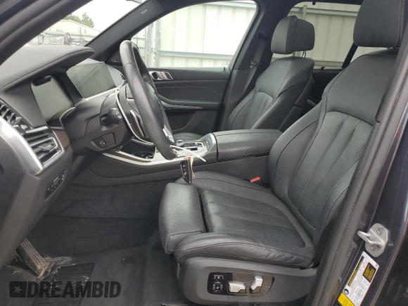 2021 BMW X5 xDrive40i with VIN 5UXCR6C01M9E49207, listed as a Copart auction lot 63399795 with 50,818 mi miles and Salvage title. Bid and sale history available at DreamBid. Image 7.