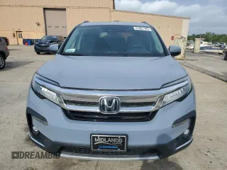 2022 Honda Pilot Touring 7-Passenger z VIN 5FNYF5H69NB031540, wystawiony jako Copart lot #51661185 z przebiegiem 58 316 mil mil oraz Szkoda całkowita • Salvage title. Historia ofert i sprzedaży dostępna na DreamBid. Obrazek 5.