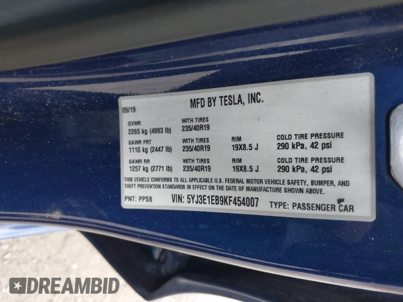 2019 Tesla Model 3 Long Range with VIN 5YJ3E1EB9KF454007, listed as a IAAI auction lot 41769346 with 141,609 mi miles. Bid and sale history available at carsss.com. Image 9.