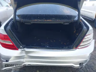 2015 Mercedes-Benz C with VIN WDDGJ4HB1FG372798, listed as a IAAI auction lot 41968536 with 56,007 mi miles. Bid and sale history available at carsss.com. Image 16.