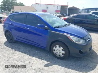 2013 Hyundai Accent GS z VIN KMHCT5AEXDU128879, wystawiony jako IAAI lot #42463478 z przebiegiem 213 810 mil mil oraz . Historia ofert i sprzedaży dostępna na DreamBid. Obrazek 1.