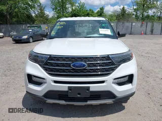 2021 Ford Explorer XLT z VIN 1FMSK8DH5MGA54632, wystawiony jako IAAI lot #42229993 z przebiegiem 34 304 mil mil oraz . Historia ofert i sprzedaży dostępna na DreamBid. Obrazek 12.