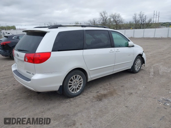 2007 Toyota Sienna XLE with VIN 5TDZK22C57S081282, listed as a IAAI auction lot 42154188 with 245,815 mi miles. Bid and sale history available at carsss.com. Image 4.