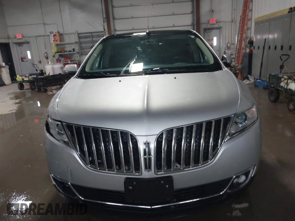 2014 Lincoln MKX with VIN 2LMDJ8JK7EBL16661, listed as a IAAI auction lot 41595967 with 77,868 mi miles. Bid and sale history available at carsss.com. Image 13.