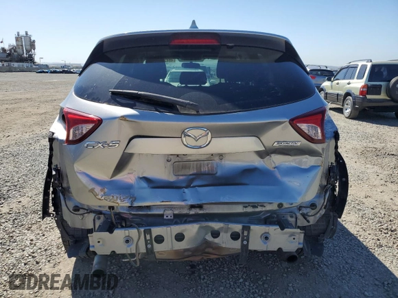 2015 Mazda CX-5 Touring with VIN JM3KE2CY5F0483492, listed as a Copart auction lot 48426065 with 158,749 mi miles and Salvage Title. Bid and sale history available at carsss.com. Image 6.