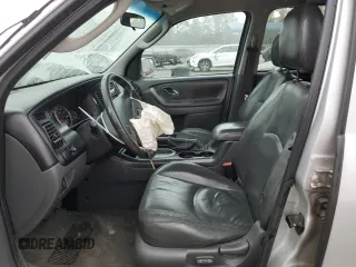 2006 Mazda Tribute i with VIN 4F2YZ02Z26KM14821, listed as a Copart auction lot 71718434 with 318,841 mi miles and Salvage Title. Bid and sale history available at carsss.com. Image 7.