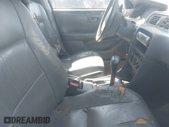 1998 Toyota Camry LE z VIN JT2BF22K6W0117441, wystawiony jako IAAI lot #41720451 z przebiegiem Nie podano mil oraz . Historia ofert i sprzedaży dostępna na DreamBid. Obrazek 5.