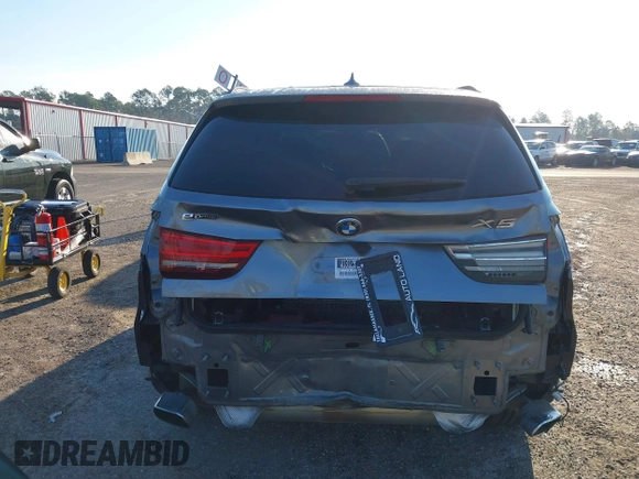 2016 BMW X5 xDrive40e with VIN 5UXKT0C57G0S75476, listed as a IAAI auction lot 41642249 with 105,489 mi miles and . Bid and sale history available at DreamBid. Image 17.