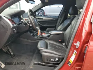 2019 BMW X4 M40i with VIN 5UXUJ5C55KLA93345, listed as a Copart auction lot 61192795 with 102,244 mi miles and Clean title. Bid and sale history available at DreamBid. Image 7.