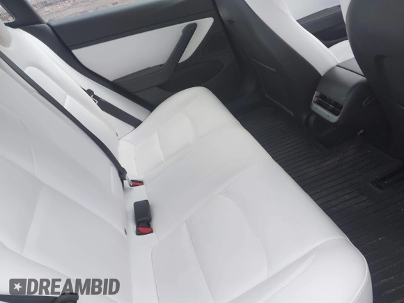 2021 Tesla Model 3 Long Range with VIN 5YJ3E1EB0MF902833, listed as a IAAI auction lot 41854474 with 41,982 mi miles and . Bid and sale history available at DreamBid. Image 8.