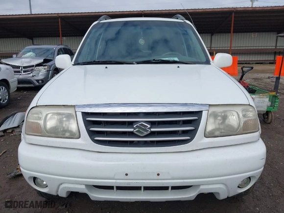 2001 Suzuki Grand Vitara JLX with VIN JS3TD62V114157738, listed as a IAAI auction lot 41721813 with 134,661 mi miles. Bid and sale history available at carsss.com. Image 6.