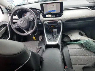 2024 Toyota RAV4 Hybrid XLE Premium with VIN 2T3B6RFV8RW074600, listed as a Copart auction lot 59560115 with 23,839 mi miles and Salvage title. Bid and sale history available at DreamBid. Image 8.