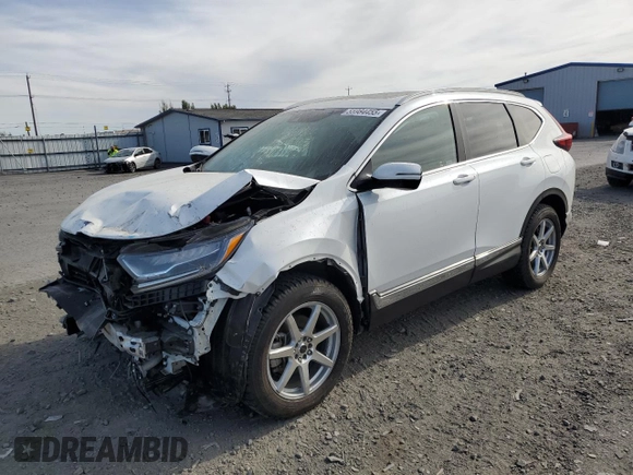 2021 Honda CR-V Touring z VIN 2HKRW2H92MH661297, wystawiony jako Copart lot #55984455 z przebiegiem 23 437 mil mil oraz Szkoda całkowita • Salvage title. Historia ofert i sprzedaży dostępna na DreamBid. Obrazek 1.