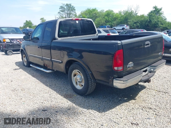 1998 Ford F-150 with VIN 1FTZX1762WNB88647, listed as a IAAI auction lot 42682271 with 187,520 mi miles and . Bid and sale history available at DreamBid. Image 3.