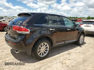 2015 Lincoln MKX z VIN 2LMDJ8JK1FBL31836, wystawiony jako Copart lot #56241005 z przebiegiem 128 613 mil mil oraz Szkoda całkowita • Salvage title. Historia ofert i sprzedaży dostępna na DreamBid. Obrazek 3.