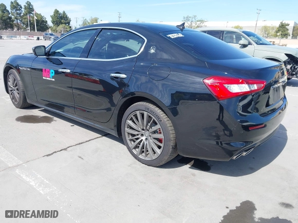 2019 Maserati Ghibli with VIN ZAM57XSA5K1328183, listed as a IAAI auction lot 41970101 with 61,260 mi miles. Bid and sale history available at carsss.com. Image 3.