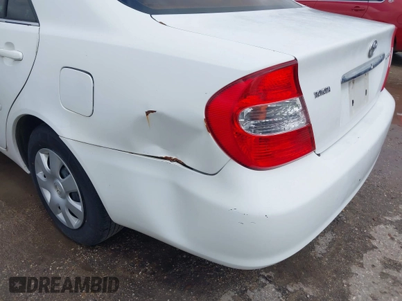 2004 Toyota Camry LE with VIN 4T1BE32K84U340887, listed as a IAAI auction lot 42143000 with Not Provided miles and . Bid and sale history available at DreamBid. Image 6.