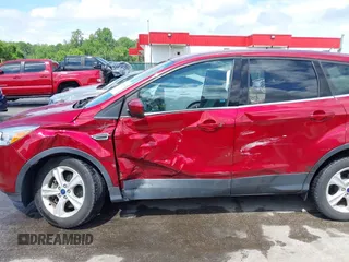 2016 Ford Escape SE z VIN 1FMCU9GX0GUB51525, wystawiony jako IAAI lot #42237629 z przebiegiem 76 616 mil mil oraz . Historia ofert i sprzedaży dostępna na DreamBid. Obrazek 6.
