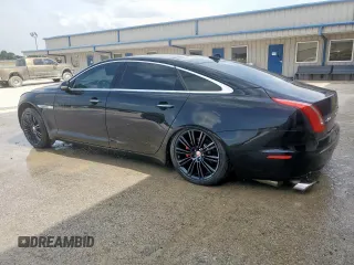 2014 Jaguar XJ Portfolio with VIN SAJWA2GZ2E8V64993, listed as a Copart auction lot 88774965 with 78,689 mi miles and Salvage title. Bid and sale history available at DreamBid. Image 2.