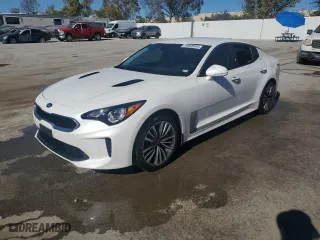2019 Kia Stinger with VIN KNAE15LA5K6051365, listed as a Copart auction lot 74068034 with 106,590 mi miles and Salvage Title. Bid and sale history available at carsss.com. Image 1.