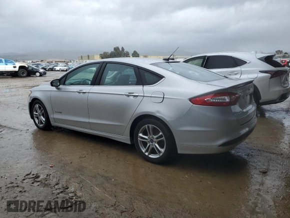 2016 Ford Fusion SE Hybrid with VIN 3FA6P0LU8GR261476, listed as a Copart auction lot 45362235 with 164,507 mi miles and Salvage Title. Bid and sale history available at carsss.com. Image 2.