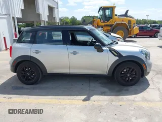 2013 MINI Countryman S z VIN WMWZC3C50DWP21636, wystawiony jako IAAI lot #42113244 z przebiegiem 85 344 mil mil oraz . Historia ofert i sprzedaży dostępna na DreamBid. Obrazek 13.