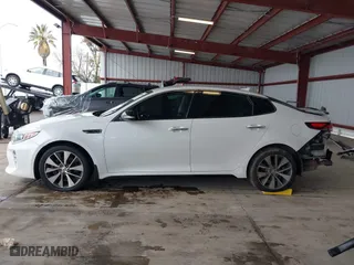 2017 Kia Optima SX with VIN 5XXGW4L2XHG136843, listed as a IAAI auction lot 41806606 with 157,899 mi miles. Bid and sale history available at carsss.com. Image 14.