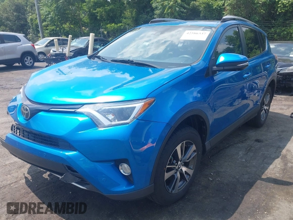 2018 Toyota RAV4 XLE with VIN JTMWFREVXJJ751586, listed as a IAAI auction lot 42586337 with 55,821 mi miles and . Bid and sale history available at DreamBid. Image 18.