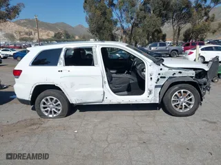 2021 Jeep Grand Cherokee Laredo X with VIN 1C4RJEAG3MC714500, listed as a IAAI auction lot 41637602 with 71,537 mi miles. Bid and sale history available at carsss.com. Image 14.