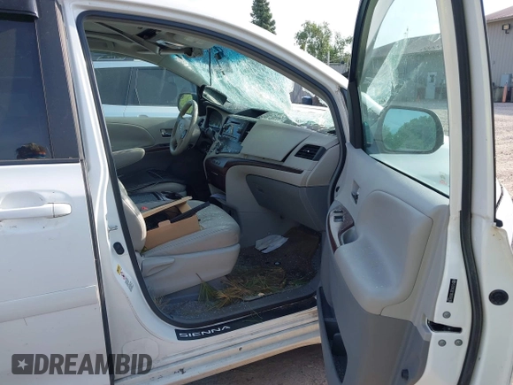 2011 Toyota Sienna XLE AAS with VIN 5TDYK3DC1BS026108, listed as a IAAI auction lot 42681177 with 201,873 mi miles and . Bid and sale history available at DreamBid. Image 5.