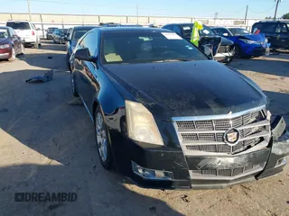 2011 Cadillac CTS Performance with VIN 1G6DK1ED9B0130927, listed as a IAAI auction lot 41414803 with 147,299 mi miles and . Bid and sale history available at DreamBid. Image 1.