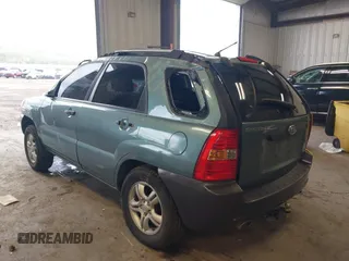 2006 Kia Sportage LX z VIN KNDJF723867179116, wystawiony jako IAAI lot #41964701 z przebiegiem 112 380 mil mil oraz . Historia ofert i sprzedaży dostępna na DreamBid. Obrazek 3.