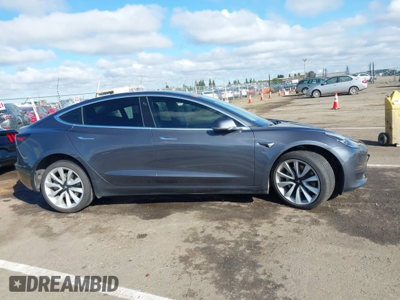 2018 Tesla Model 3 Long Range Battery with VIN 5YJ3E1EA4JF006036, listed as a IAAI auction lot 41934680 with 115,649 mi miles and . Bid and sale history available at DreamBid. Image 12.