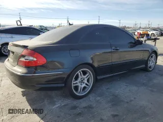 2009 Mercedes-Benz CLK 550 with VIN WDBTJ72H69F266105, listed as a Copart auction lot 79723224 with 114,840 mi miles and Salvage Title. Bid and sale history available at DreamBid. Image 3.