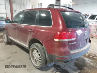 2004 Volkswagen Touareg z VIN WVGCM67LX4D038012, wystawiony jako IAAI lot #41285460 z przebiegiem Nie podano mil oraz . Historia ofert i sprzedaży dostępna na DreamBid. Obrazek 3.