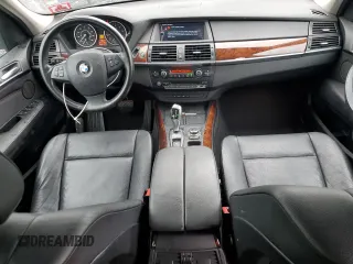 2012 BMW X5 35i with VIN 5UXZV4C57CL765053, listed as a Copart auction lot 59997275 with 157,943 mi miles and Salvage title. Bid and sale history available at DreamBid. Image 8.
