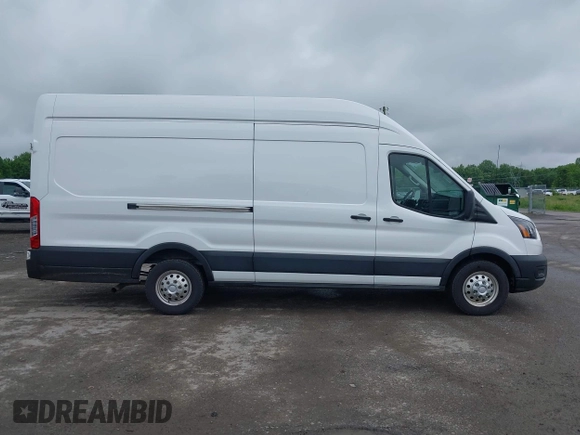 2022 Ford Transit Cargo with VIN 1FTBR3U85NKA64272, listed as a IAAI auction lot 42427708 with 62,043 mi miles and . Bid and sale history available at DreamBid. Image 14.