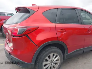 2015 Mazda CX-5 Touring with VIN JM3KE4CYXF0439953, listed as a IAAI auction lot 42124197 with 242,614 mi miles and . Bid and sale history available at DreamBid. Image 18.
