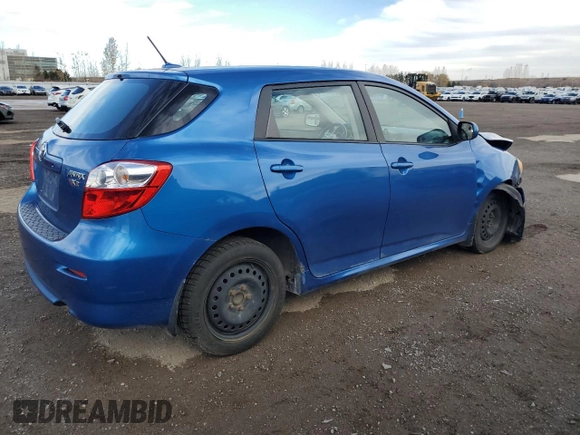 2009 Toyota Matrix S with VIN 2T1KE40E49C006626, listed as a Copart auction lot 79294614 with 176,275 mi miles and Salvage title. Bid and sale history available at DreamBid. Image 3.