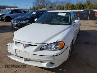 2001 Pontiac Grand Am GT with VIN 1G2NW52E11C244447, listed as a IAAI auction lot 41697883 with 81,983 mi miles. Bid and sale history available at carsss.com. Image 17.