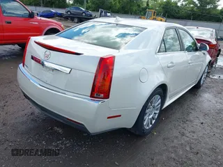 2012 Cadillac CTS Luxury with VIN 1G6DG5E57C0137409, listed as a IAAI auction lot 42633890 with 86,886 mi miles and . Bid and sale history available at DreamBid. Image 4.