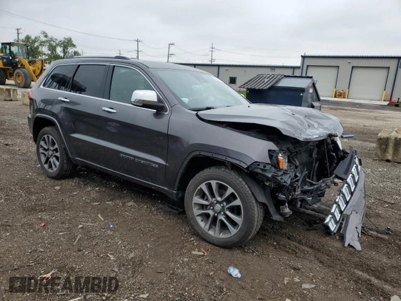2017 Jeep Grand Cherokee Overland with VIN 1C4RJFCG8HC607872, listed as a Copart auction lot 57493195 with 164,478 mi miles and Salvage title. Bid and sale history available at DreamBid. Image 4.