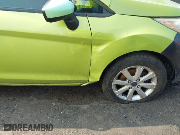 2011 Ford Fiesta SE z VIN 3FADP4BJ7BM122774, wystawiony jako IAAI lot #42392327 z przebiegiem 174 764 mil mil oraz . Historia ofert i sprzedaży dostępna na DreamBid. Obrazek 13.