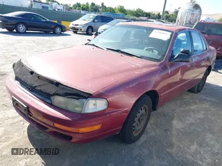 1992 Toyota Camry LE z VIN JT2SK12E5N0024814, wystawiony jako IAAI lot #42386859 z przebiegiem 235 476 mil mil oraz . Historia ofert i sprzedaży dostępna na DreamBid. Obrazek 2.