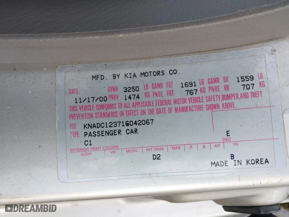 2001 Kia Rio with VIN KNADC123716042067, listed as a IAAI auction lot 41449479 with 113,108 mi miles. Bid and sale history available at carsss.com. Image 9.