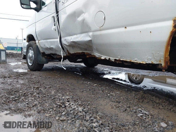 2011 Ford Econoline Cargo Commercial with VIN 1FTNE1EW1BDA17492, listed as a IAAI auction lot 41036647 with 242,810 mi miles and . Bid and sale history available at DreamBid. Image 6.